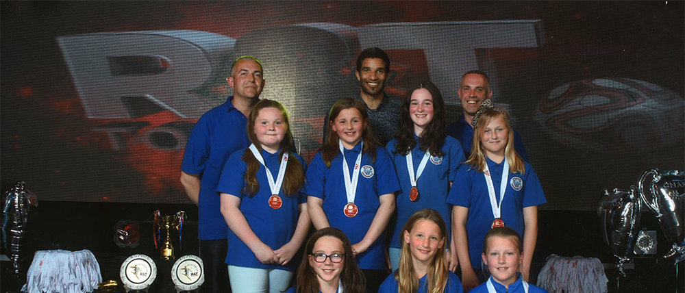 Woking Cougars Receive Medals From Former England Goal Keeper David James