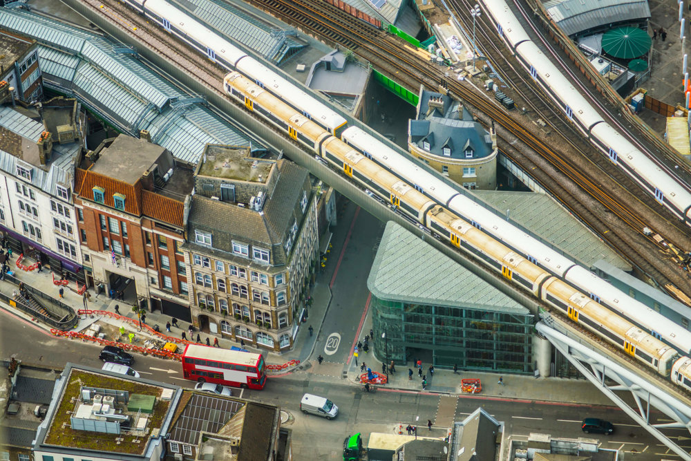 Train lines running overhead buildings in London designed to reduce noise and vibrations