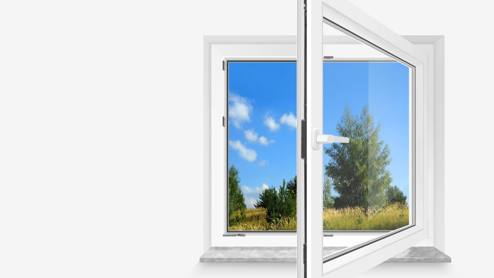 Image of open window with trees and fields to outside
