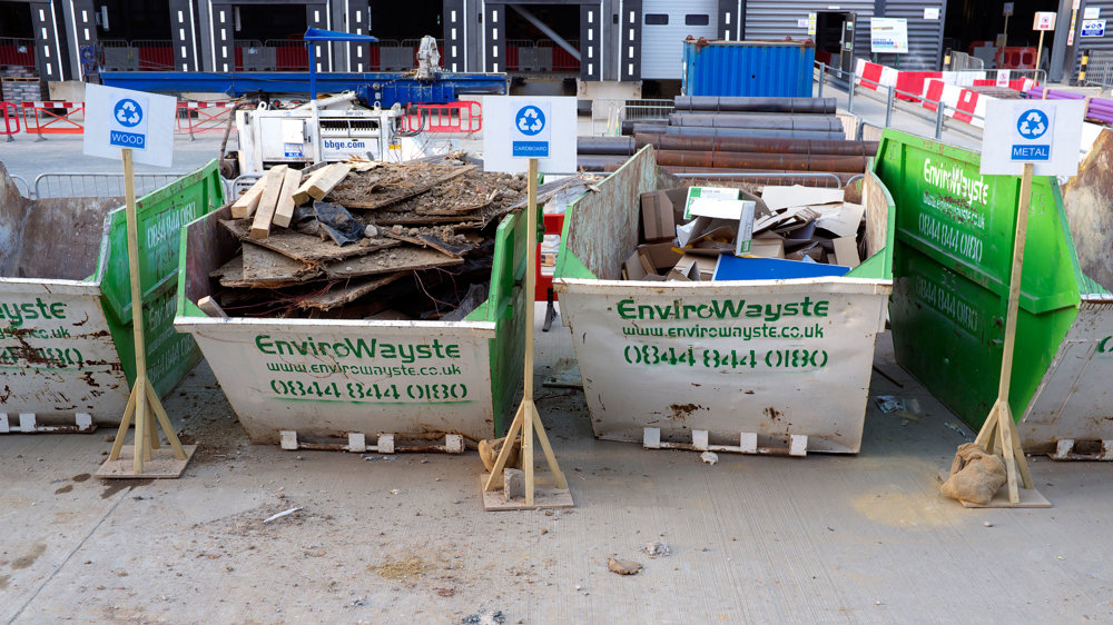 EnviroWayste skips at local dumps signposted for either metal or wood